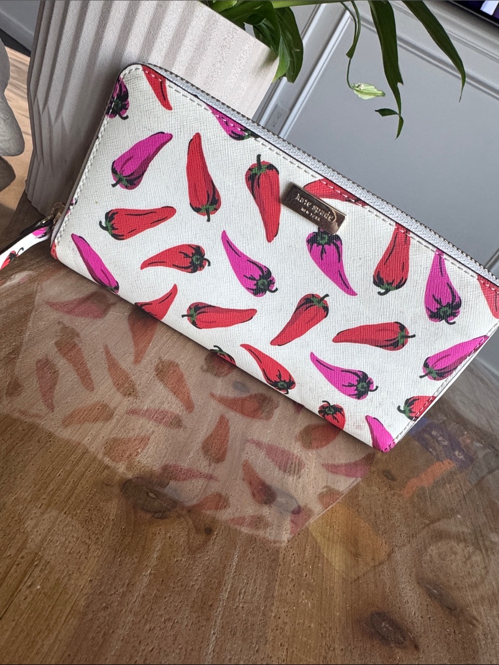 kate spade white zip-around wallet with red & pink pepper print